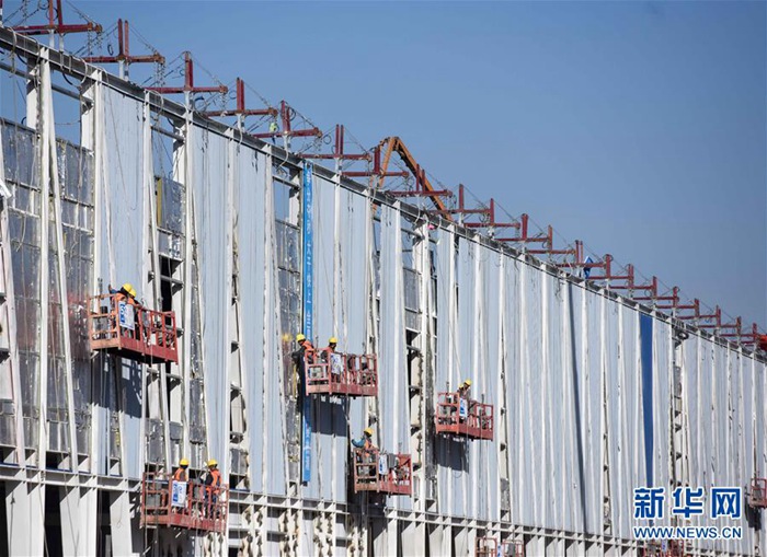 Galeria: Trabalhadores garantem construção do centro de serviços em Xiongan durante Festival da Primavera